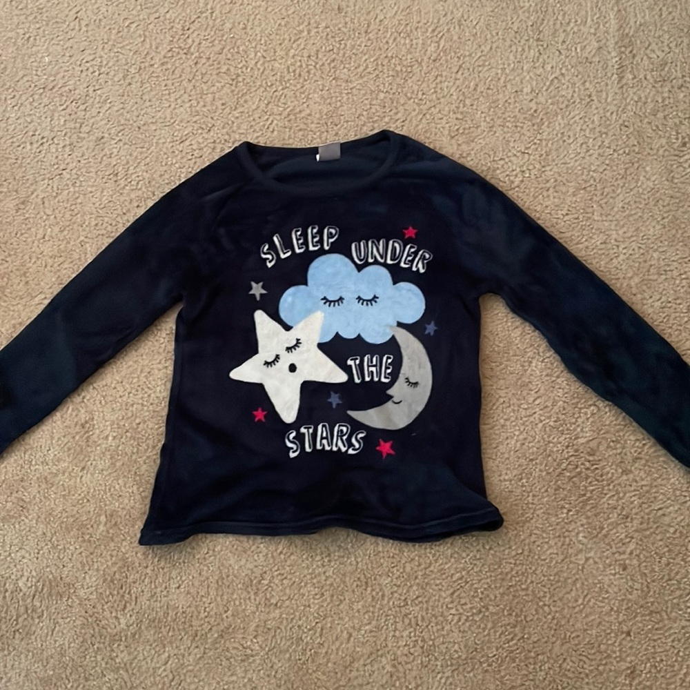 A long sleeve, fur textured pajama shirt